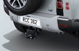 Регулируемое по высоте буксировочное устройство, комплект — для автомобилей 110, с пружинной подвеской, включает крышку проушины для буксировки в состоянии под окраску, с 2023 м. г. image